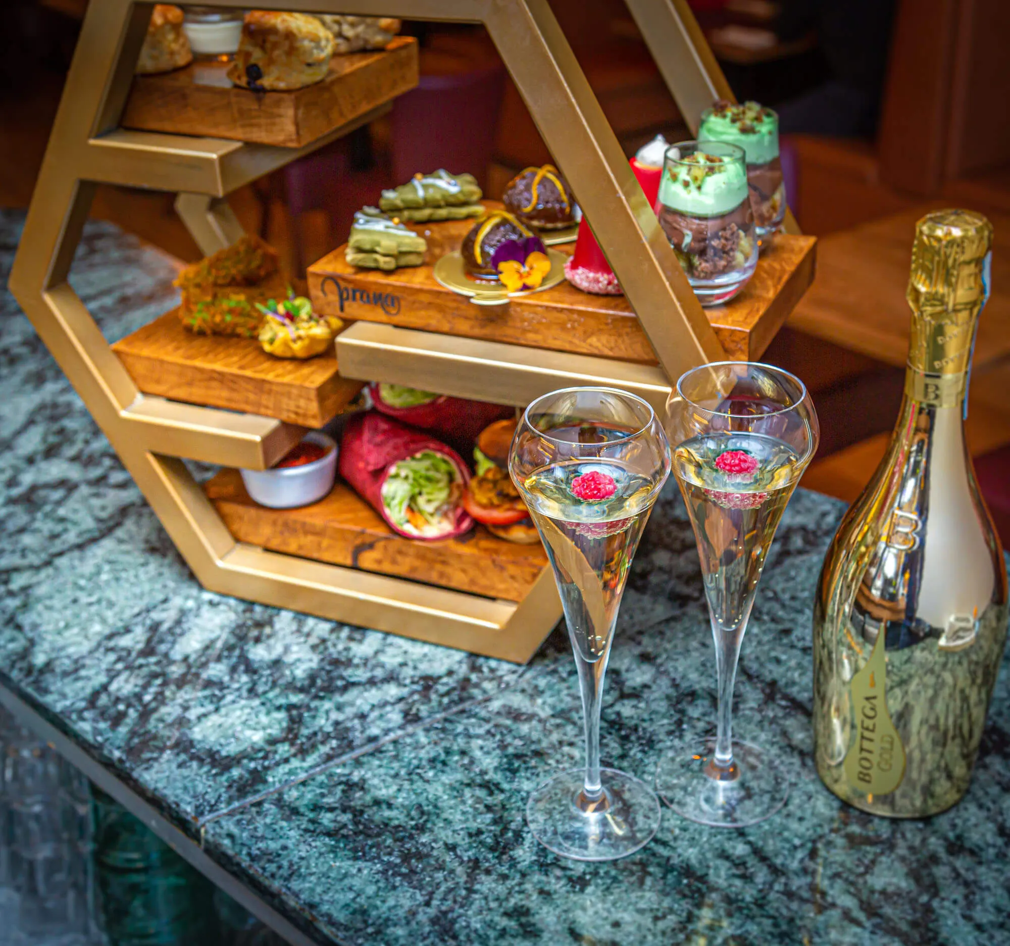 An afternoon chai tower with champagne flutes